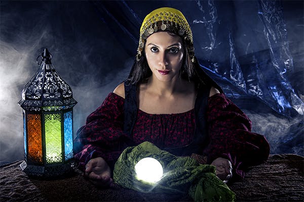 Img-of-Female-fortune-teller-doing-a-psychic-reading-with-a-cystal-ball-predicting-fate-or-destiny-and-the-future.